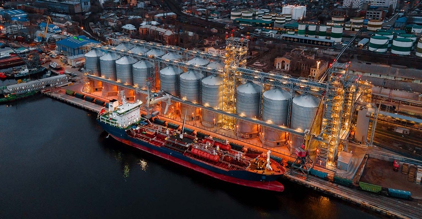 Ship filling at Ukraine grain terminal at night