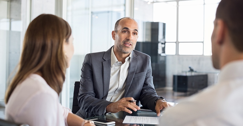 Couple meeting with financial advisor