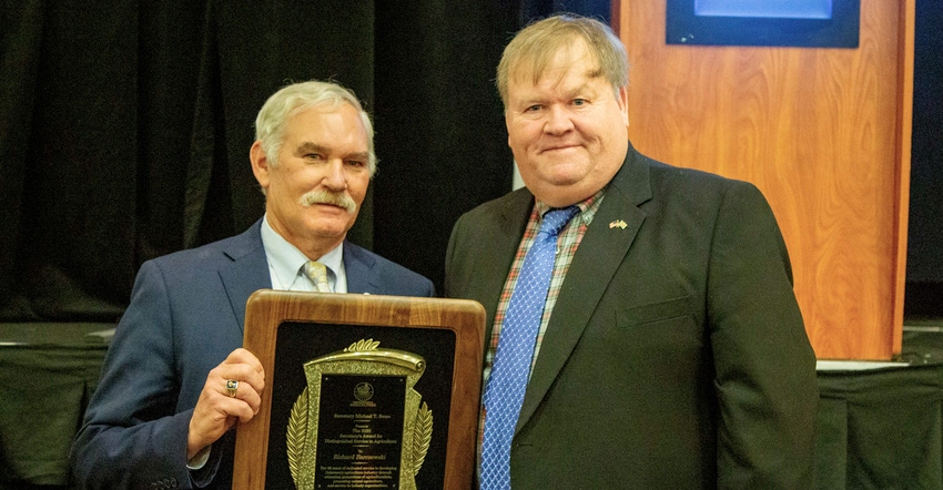 Michael T. Scuse presents the 2020 Secretary’s Award for Distinguished Service to Agriculture to Richard Barczewski