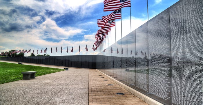 A replica of the Vietnam Veterans Memorial in Washington D.C. stands in the farm fields outside of Perryville, Mo. 