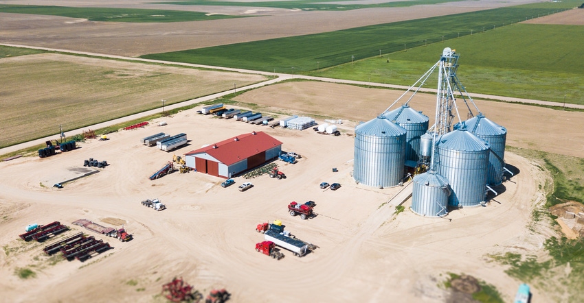 Aerial view of grain, silos and farmland