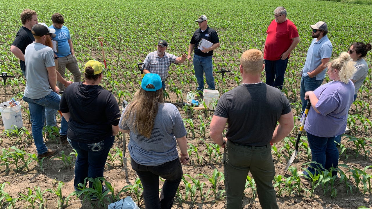NRCS soil scientist Jason Steele instructs a group of NRCS employees during Soil Health and Sustainability training
