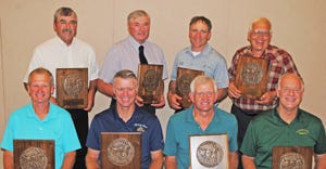 2020 and 2021 Wisconsin Master Agriculturists holding plaques
