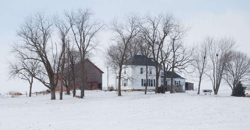 barn and farmhouse in winter