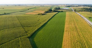 scenic aerial view of fields of varying colors and angles