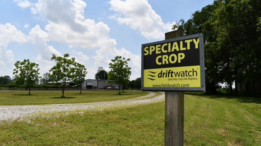 DriftWatch sign placed at entrance of specialty crop farm.