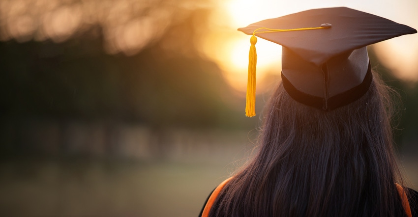 Graduate wearing graduation cap