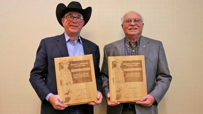 Steve Gunn and Bob Bishop holding awards