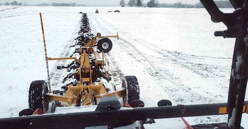 Tiling in snowy field