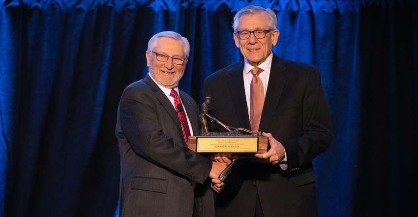 Illinois Farm Bureau President Rich Guebert presents the Charles B. Shuman Distinguished Service Award to Ed McMillan Illinois Farm Bureau President Rich Guebert presents the Charles B. Shuman Distinguished Service Award to Ed McMillan