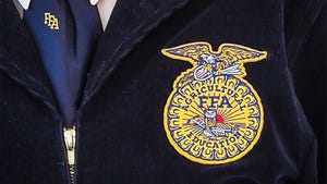 Close-up of FFA patch on blue corduroy jacket