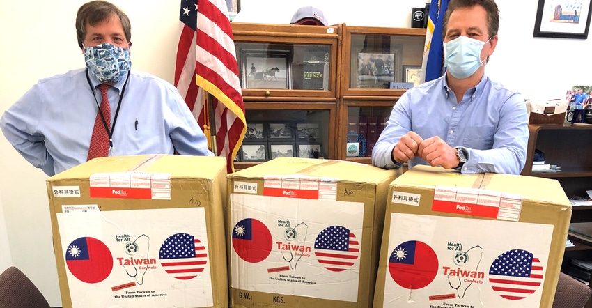 Minnesota Department of Agriculture commissioner Thom Petersen and Jeff Phillips, MDA international trade manager, are shown 