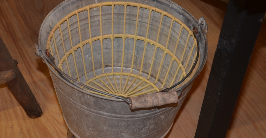 mystery tool from 1950s that looks like a galvanized bucket