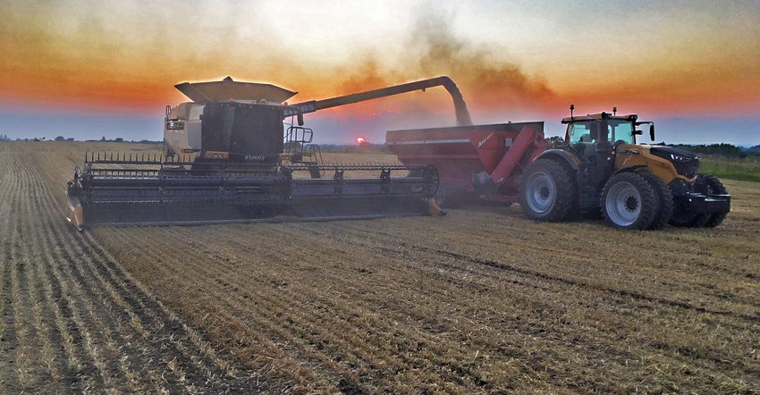 Adam Kramer harvests one of his last loads of wheat in 