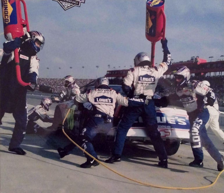Mike Knauer works as part of NASCAR’s Jimmie Johnson’s pit crew