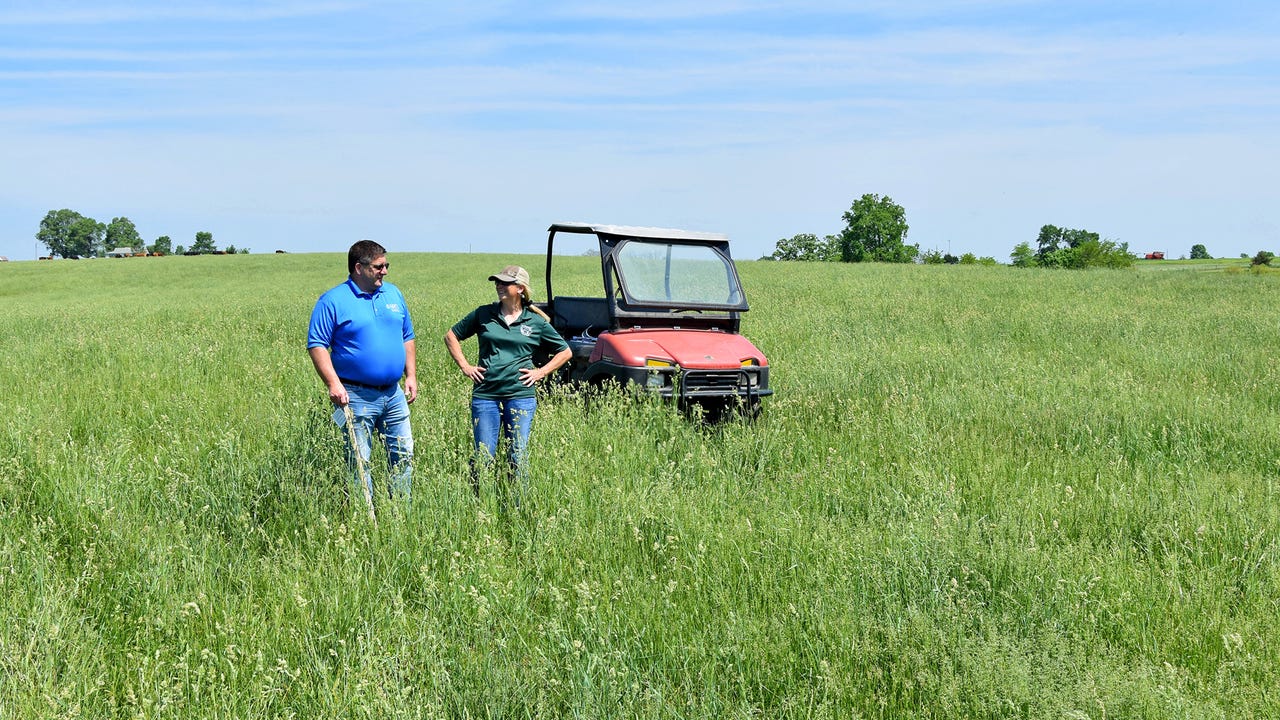 Jeff Matthias, Iowa USDA-NRCS state grazing specialist works with a Davis County landowner on her pasture
