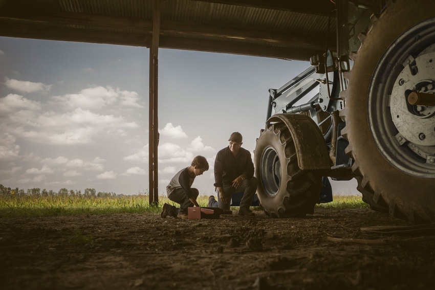 father-son-working-on-tractor-GettyImages-470622691.jpg father-son-working-on-tractor-GettyImages-470622691.jpg