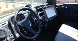 John Deere Gator decked out with GPS receiver and autosteer 