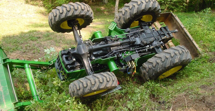 A rolled over tractor in field