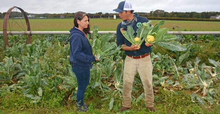 Lee and Ann Marie Calabro of the Suffolk County Soil & Conservation District talk on the farm
