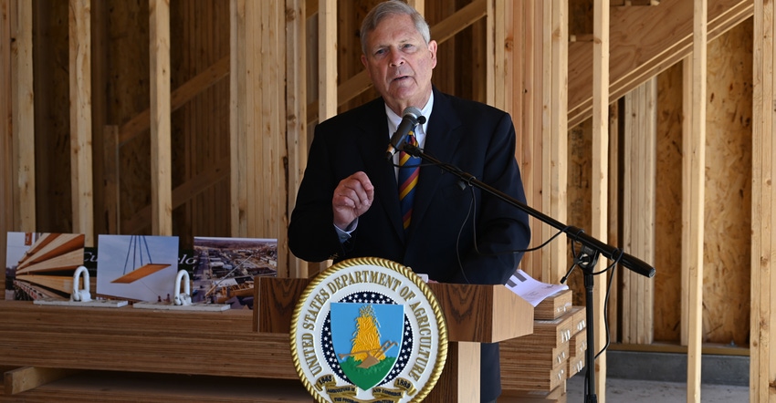 Secretary of Agriculture Tom Vilsack visiting a mass timber building construction site in West Des Moines, Iowa