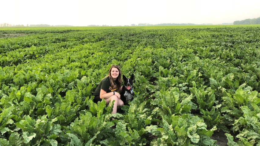 Sarah McNaughton in field with dog Sarah McNaughton in field with dog