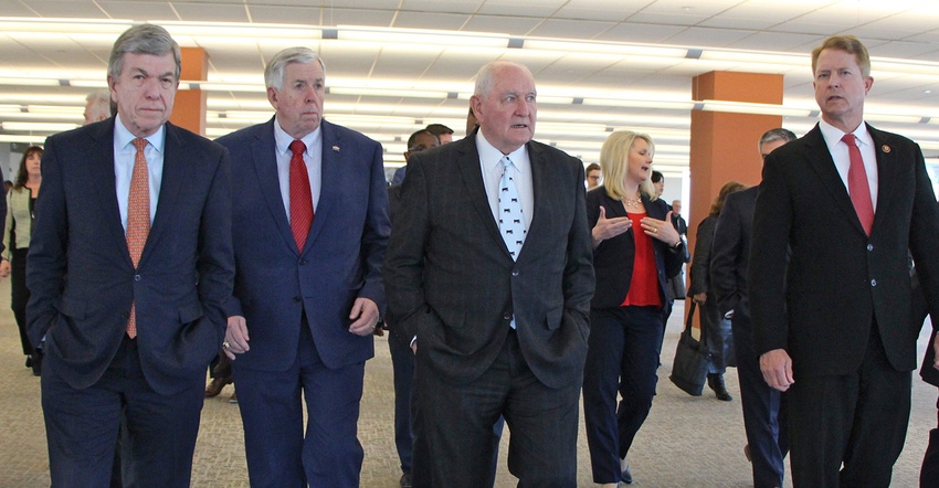 USDA Secretary Sonny Perdue walks with U.S. Sen. Roy Blunt, Gov. Mike Parson and U.S. Congressman Roger Marshal 