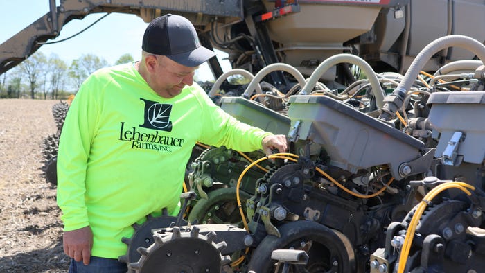 Mark Lehenbauer inspecting a planter