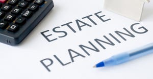 Calculator and pen with estate planning