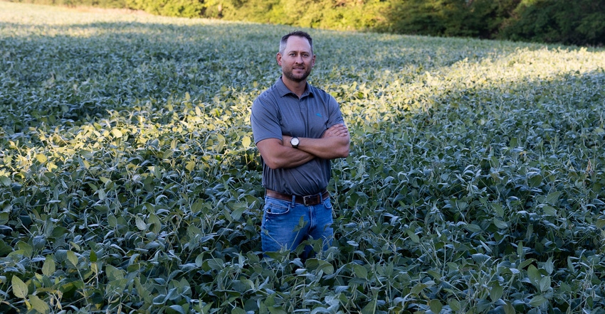 Joel Barickman smiles for the camera in his soybean field in Livingston County, Ill. Joel Barickman smiles for the camera in his soybean field in Livingston County, Ill.