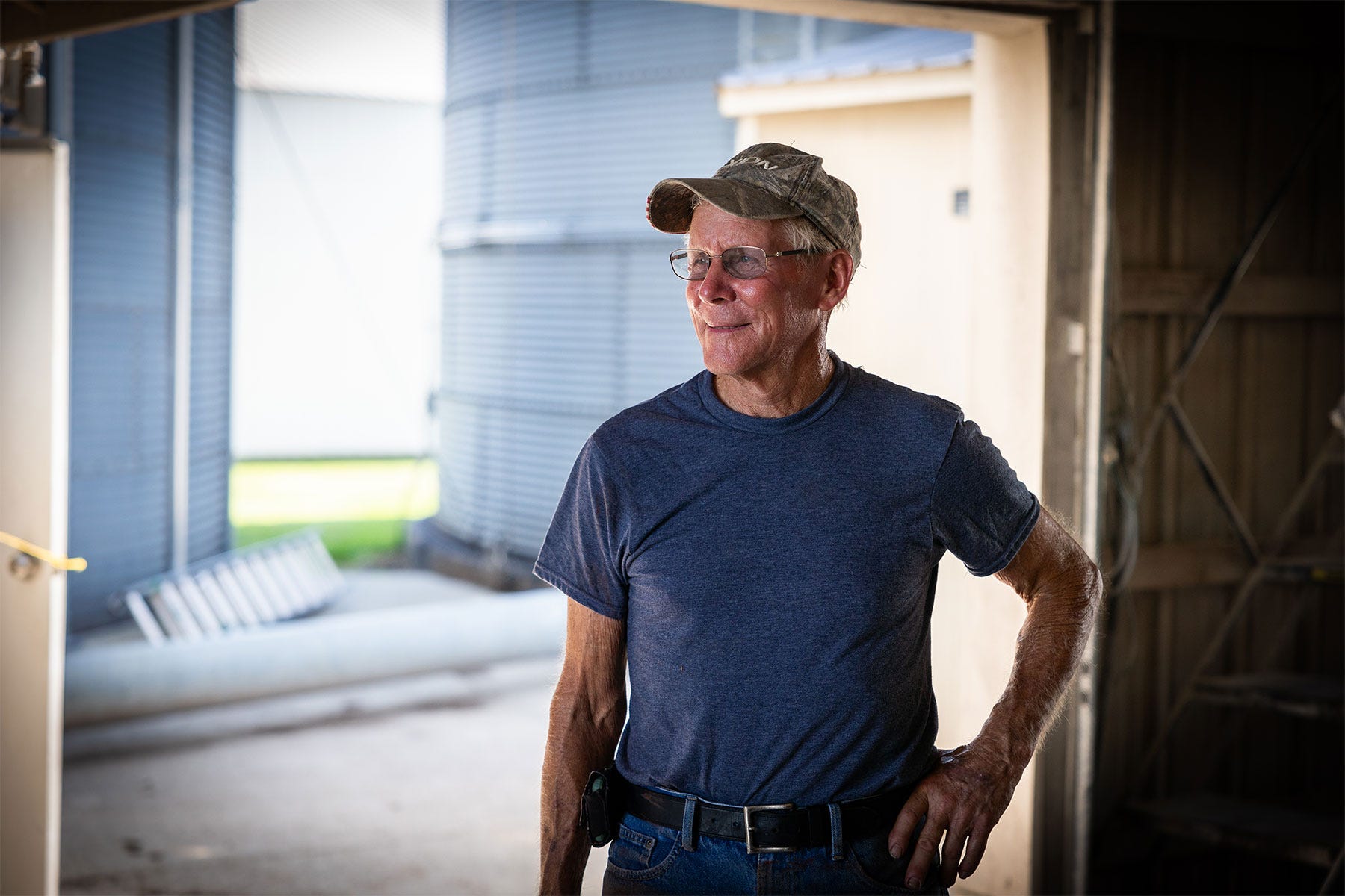 Bill H. Voorhees stands inside a shed on his farm Bill H. Voorhees stands inside a shed on his farm