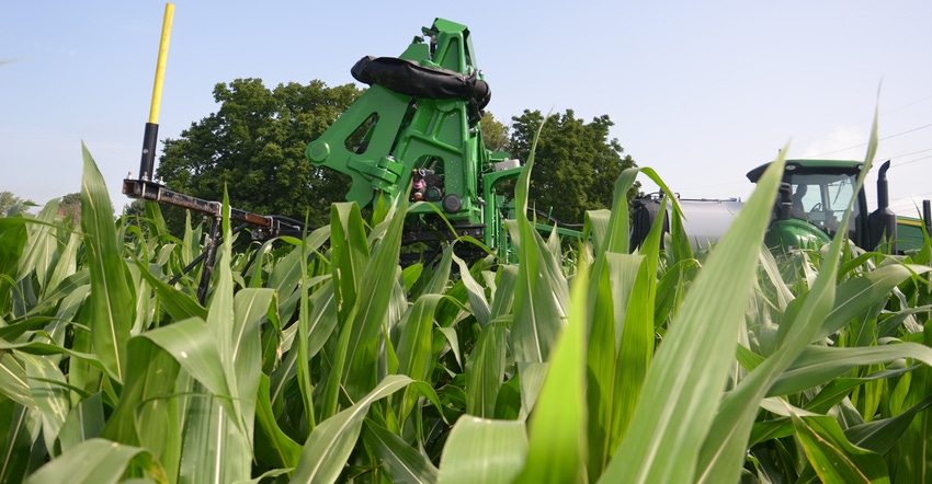 tractor applying nitrogen in corn late-season