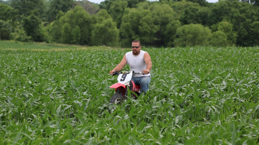 scouting corn on a dirt bike