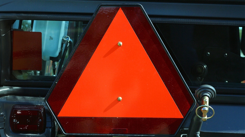 Slow moving vehicle sign on back of tractor