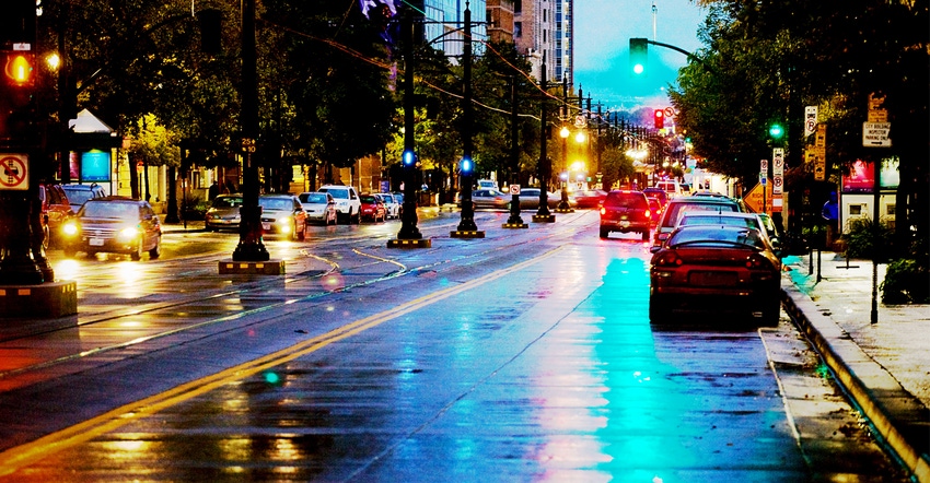 small town mainstreet at night after rainfall