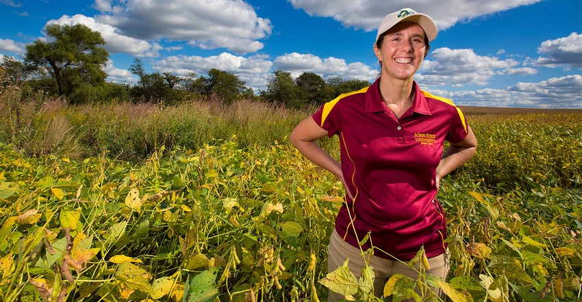 Lisa Schulte Moore, a professor at Iowa State University, stands in a soybean field 