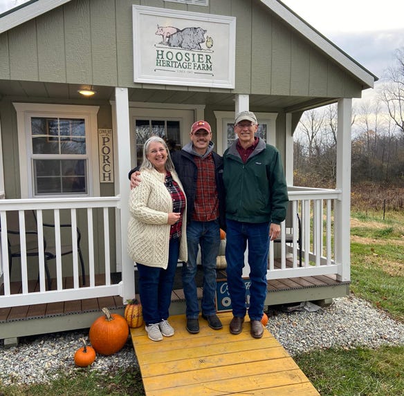 Sally Thieme, Jeffrey Sebree and Ron Thieme pose in front of Hoosier Heritage Farm’s new on-farm retail stand 