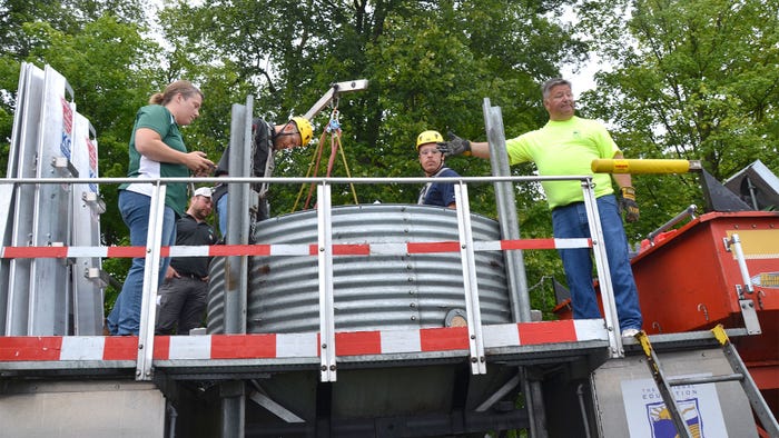 Volunteers demonstrating grain bin safety