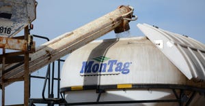 fertilizer being loaded into tank