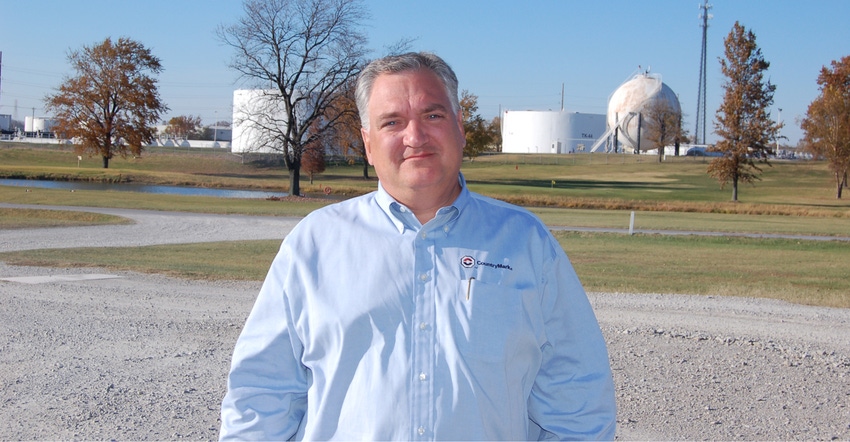 Charlie Smith stands in front of CountryMark oil refinery in Mt. Vernon, Ind.