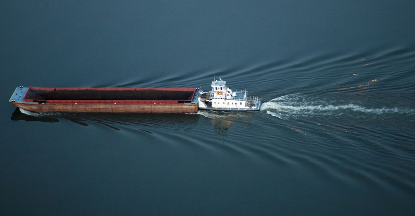 Barge moving on the river