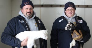 Brian and Steve Jones holding goats
