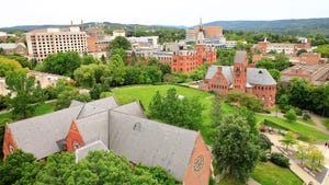 Roof top view of Cornell University campus with Barnes Hall and Sage Hall in the background