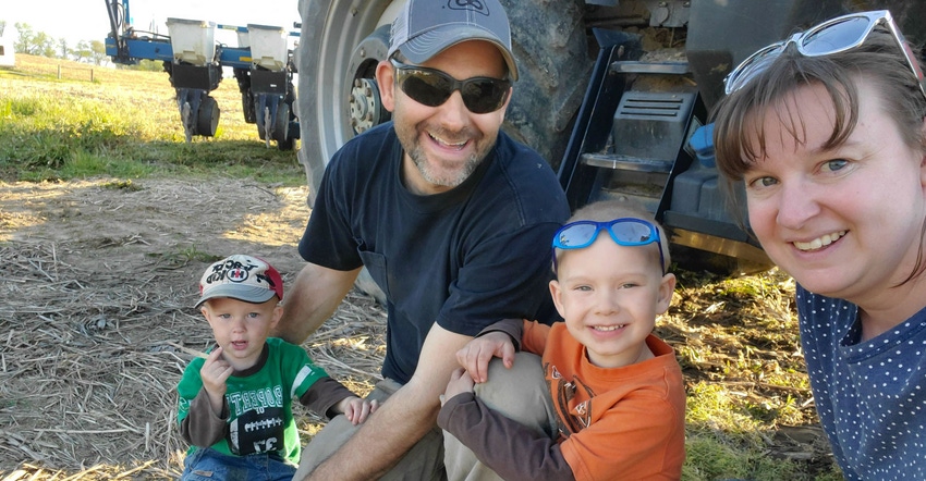 Mike and Sheilah Reskovac with their sons Cole and Caleb are back from a tractor ride