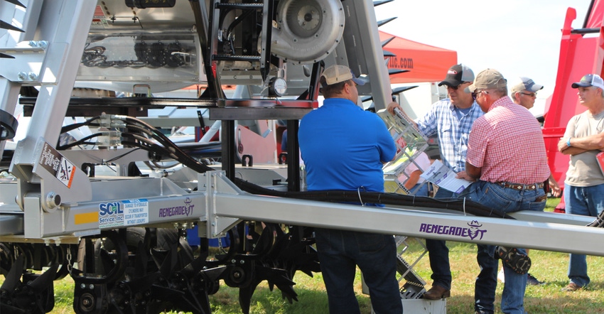 FQRMERS LOOKING AT EQUIPMENT AT HHD 