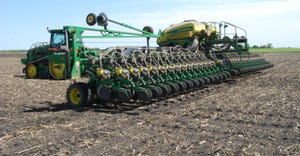 planter in a field / BIG GAIN: Of the top corn-producing states, Iowa is furthest along in planting, with 78% of its crop in 