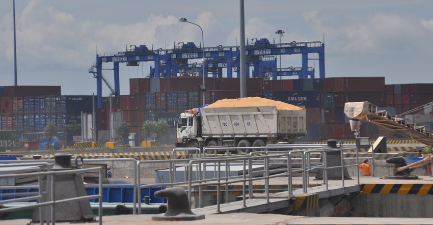truck carrying grain at shipping yard