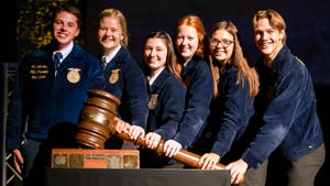 6 FFA officers next to oversized gavel