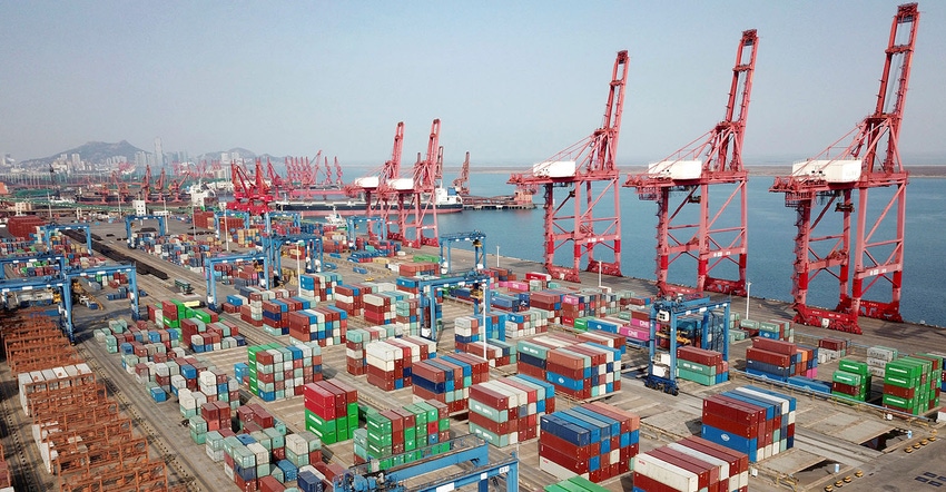 This aerial photo shows shipping containers for export stacked at a port in Lianyungang, in China's eastern Jiangsu province 