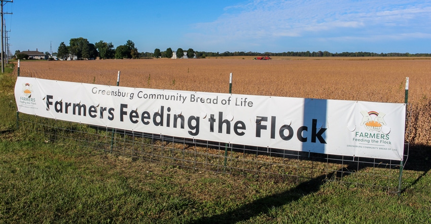 Farmers Feeding the Flock sign designates the field used for the annual fundraiser in 2022